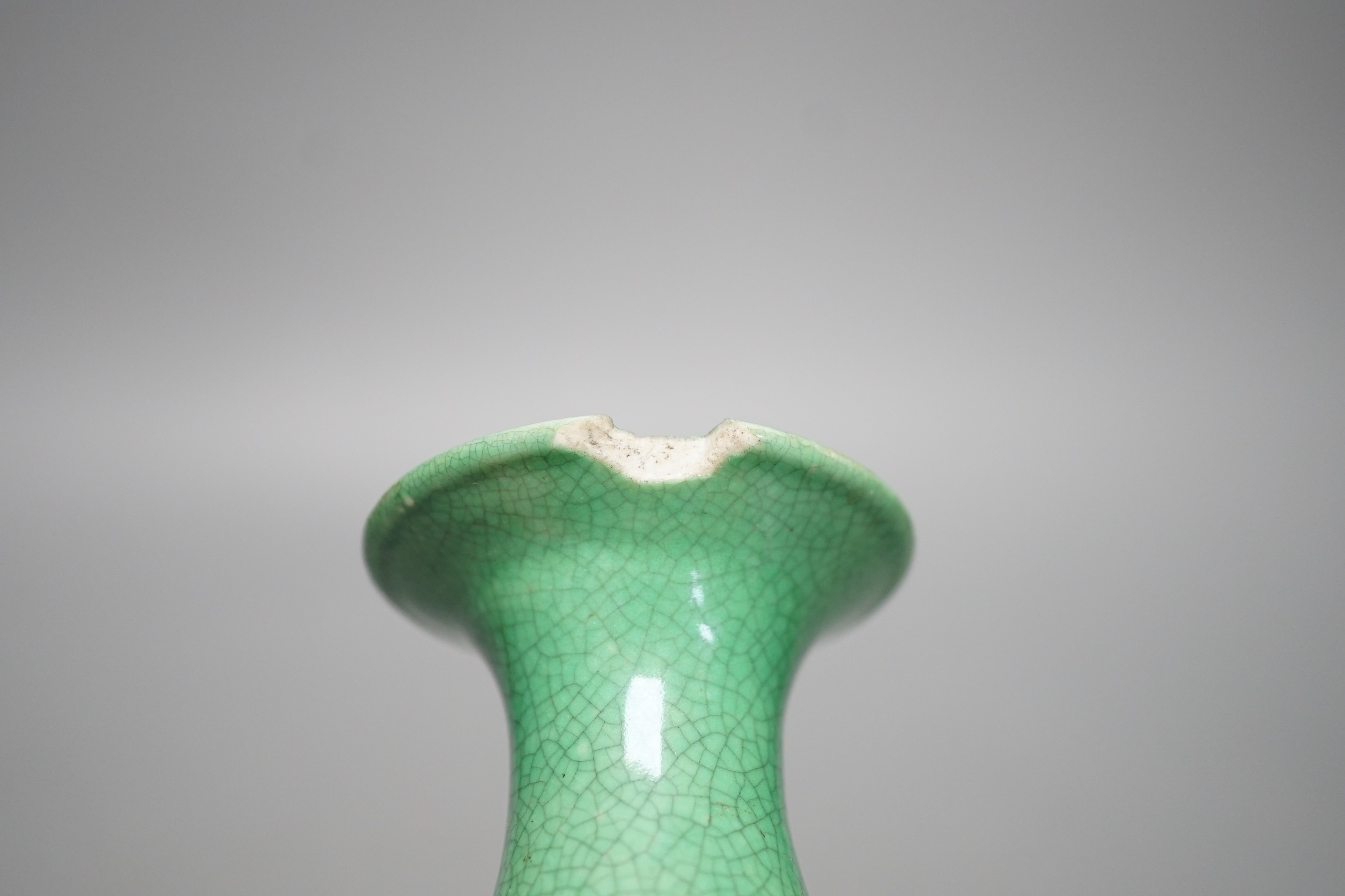 An early 20th century Chinese green crackle glazed vase (a.f.). 17cm.